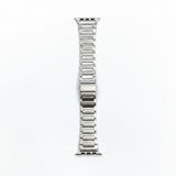 Silver stainless steel Apple Watch link band on white background